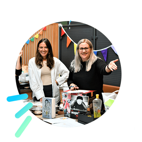 Staff at Search Laboratory digital marketing agency holding a raffle for the charity Leeds Mind.